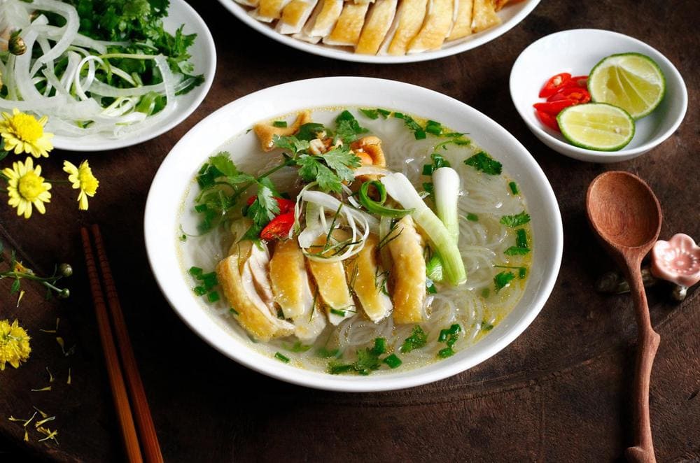 Clear glass noodles with tender chicken pieces in light broth